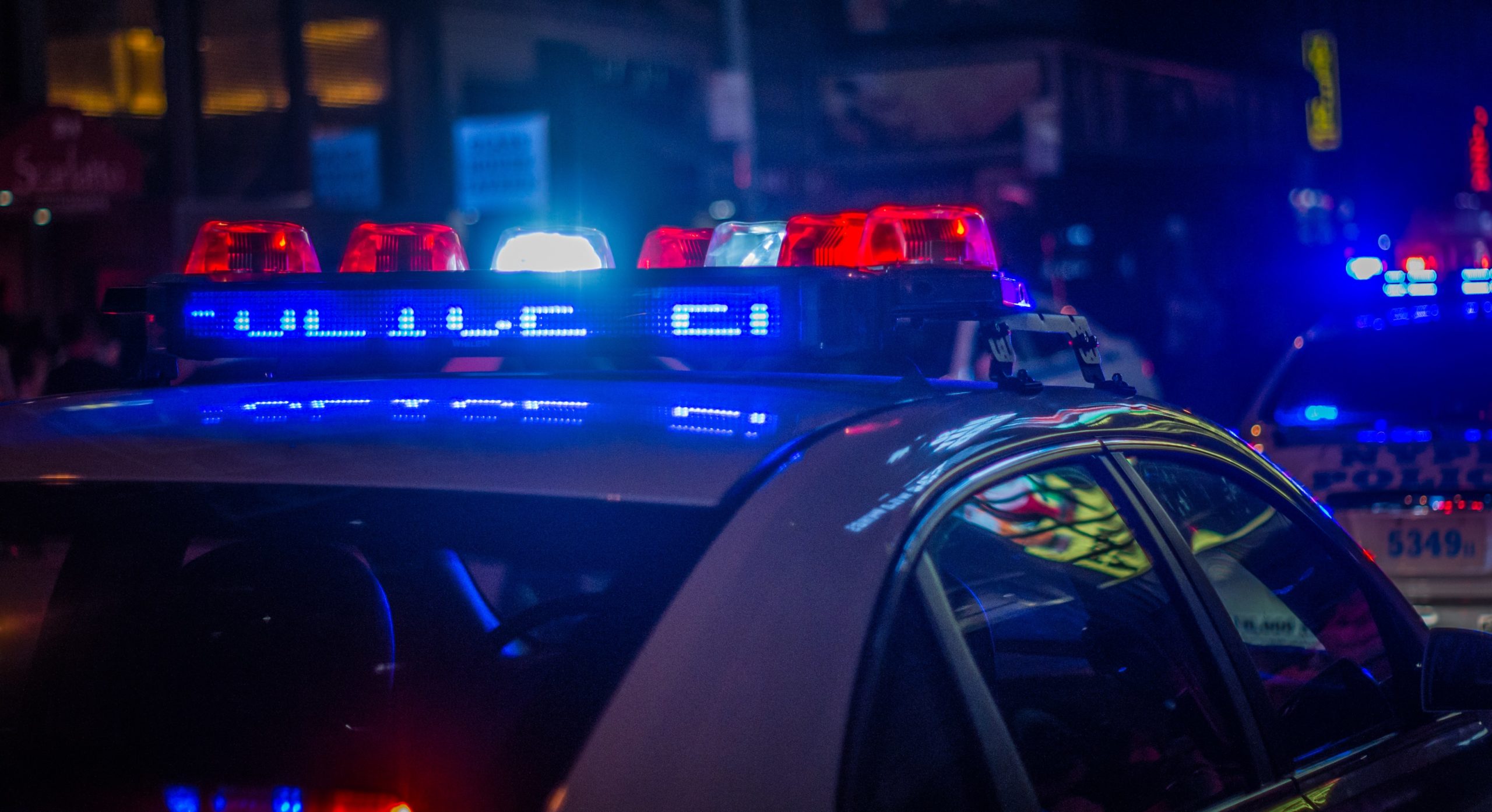 Picture of police car with lights on